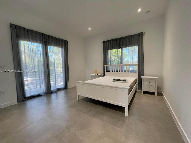 901 Estall St, Key Largo, FL 33037 - bedroom with access to outside, finished concrete flooring, and recessed lighting