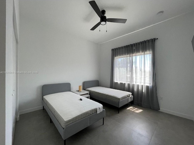 901 Estall St, Key Largo, FL 33037 - bedroom featuring baseboards and ceiling fan