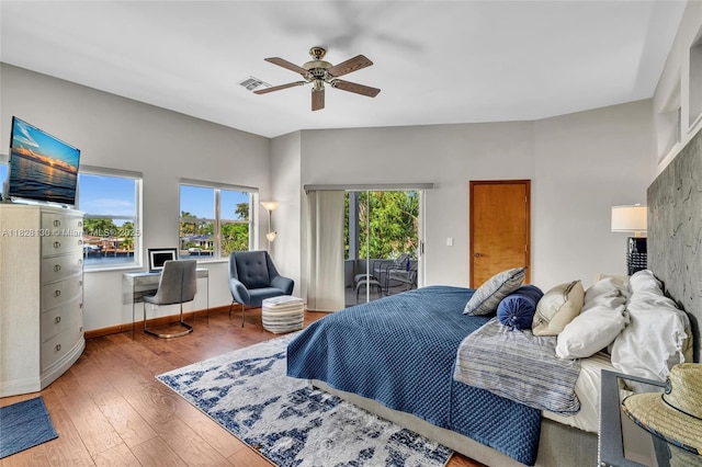 2108 NE 24th St, Wilton Manors, FL 33305 - bedroom featuring access to outside, hardwood / wood-style flooring, a ceiling fan, and an office area