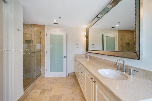 3400 SW 27th Ave Unit 1605, Miami, FL 33133 - bathroom featuring a shower stall and double vanity