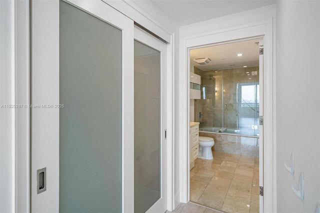 3400 SW 27th Ave Unit 1605, Miami, FL 33133 - bathroom with toilet and tiled shower / bath