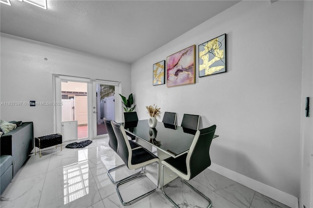 3574 W 88th Ter, Hialeah, FL 33018 - dining room featuring marble finish flooring and baseboards