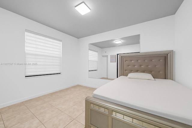 3574 W 88th Ter, Hialeah, FL 33018 - bedroom with light tile patterned floors and baseboards