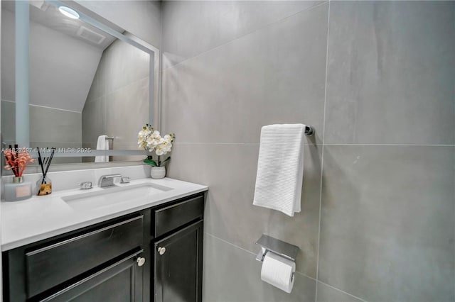 3574 W 88th Ter, Hialeah, FL 33018 - bathroom featuring vanity and vaulted ceiling