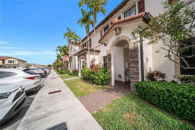 3574 W 88th Ter, Hialeah, FL 33018 - view of building exterior featuring uncovered parking