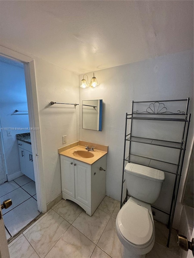 12105 NE 6th Ave Unit 304, North Miami, FL 33161 - bathroom featuring vanity and toilet
