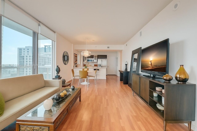 333 NE 24th St Unit 1401, Miami, FL 33137 - living area with light wood finished floors