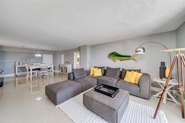 1500 S Ocean Dr Unit 7K, Hollywood, FL 33019 - living room with a textured ceiling and baseboards