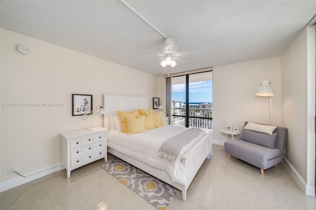 1500 S Ocean Dr Unit 7K, Hollywood, FL 33019 - bedroom featuring a textured ceiling, ceiling fan, and access to outside