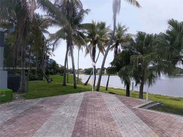 9365 Fontainebleau, Miami, FL 33172 - view of property's community with a water view and a yard