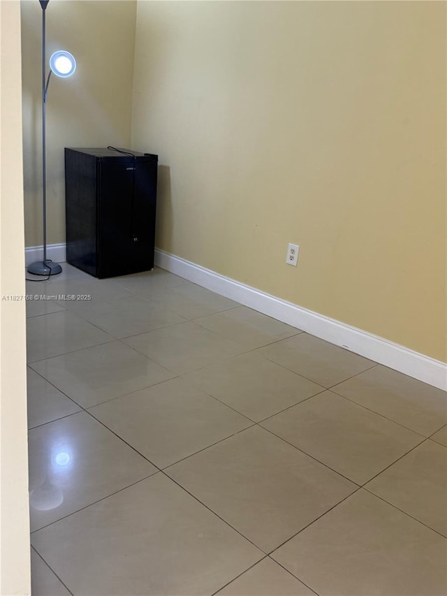 9365 Fontainebleau, Miami, FL 33172 - spare room featuring light tile patterned floors and baseboards