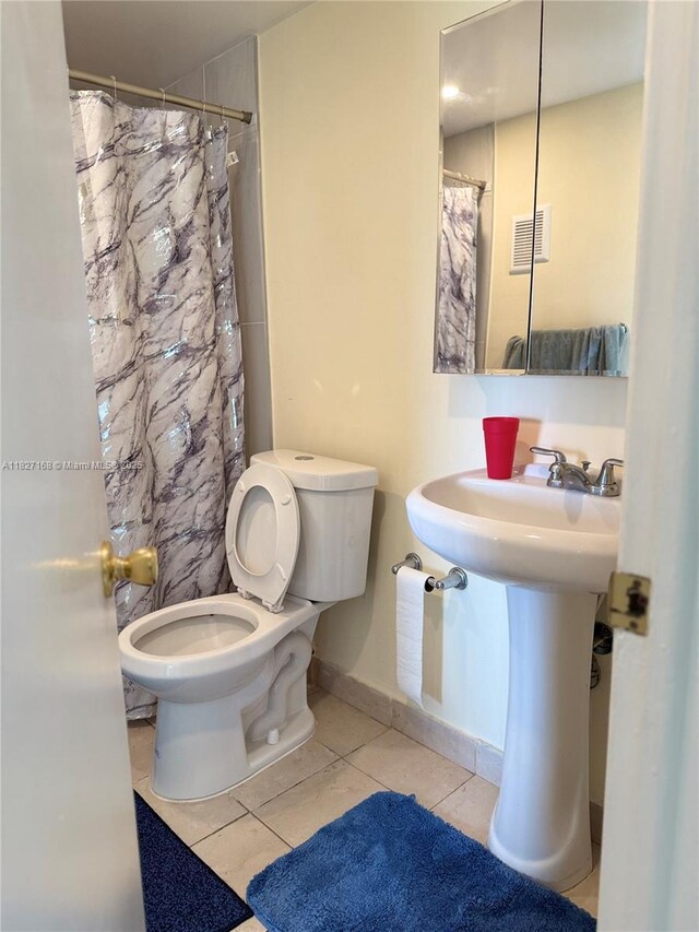 9365 Fontainebleau, Miami, FL 33172 - full bathroom with tile patterned flooring and a shower with curtain
