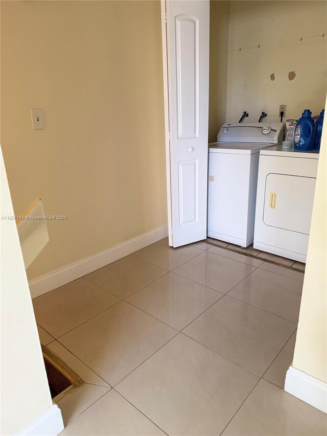 9365 Fontainebleau, Miami, FL 33172 - laundry area featuring separate washer and dryer and tile patterned floors
