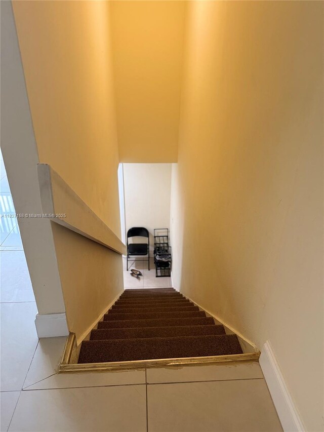 9365 Fontainebleau, Miami, FL 33172 - staircase with tile patterned flooring