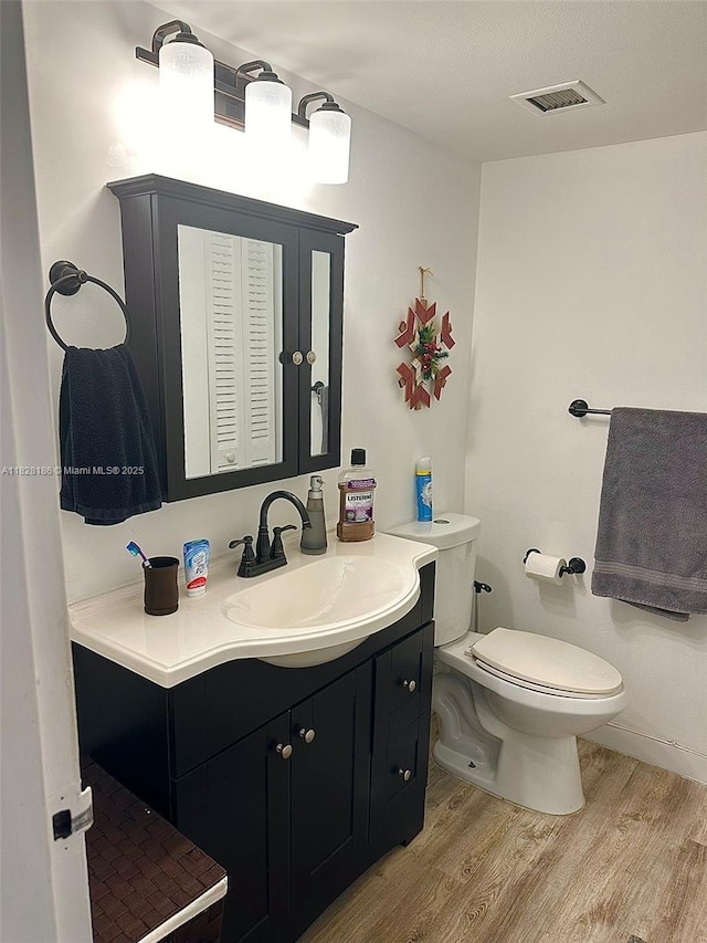 13499 Biscayne Blvd Unit 1013, North Miami, FL 33181 - bathroom with wood finished floors and vanity