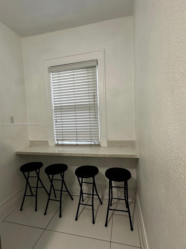 126 Mendoza Ave Unit 1, Coral Gables, FL 33134 - dining room featuring tile patterned floors