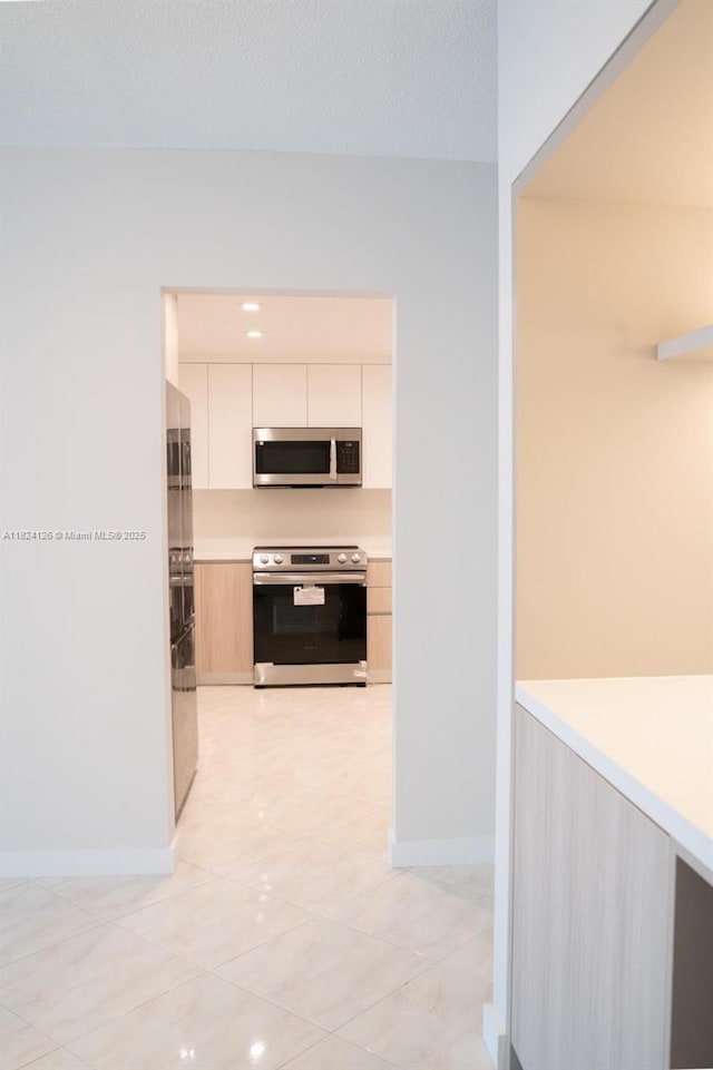 400 Kings Point Dr Unit 1222, Sunny Isles Beach, FL 33160 - corridor featuring baseboards