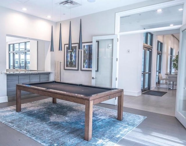 8001 NW 41st St Unit F-112, Doral, FL 33166 - rec room with french doors, billiards table, and wood finished floors