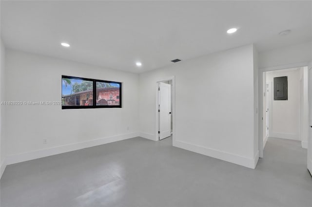 5850 Rose Ter, Plantation, FL 33317 - empty room with electric panel, finished concrete flooring, recessed lighting, and a smoke detector