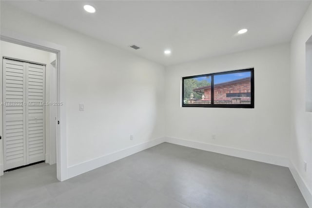 5850 Rose Ter, Plantation, FL 33317 - unfurnished bedroom with concrete floors, recessed lighting, and a closet