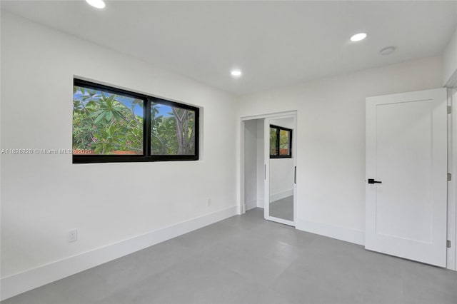 5850 Rose Ter, Plantation, FL 33317 - unfurnished bedroom featuring recessed lighting and concrete floors