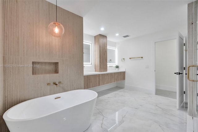 5850 Rose Ter, Plantation, FL 33317 - full bathroom with a soaking tub, double vanity, recessed lighting, and marble finish floors