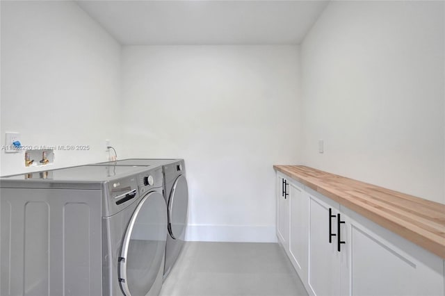 5850 Rose Ter, Plantation, FL 33317 - laundry area featuring cabinet space and separate washer and dryer