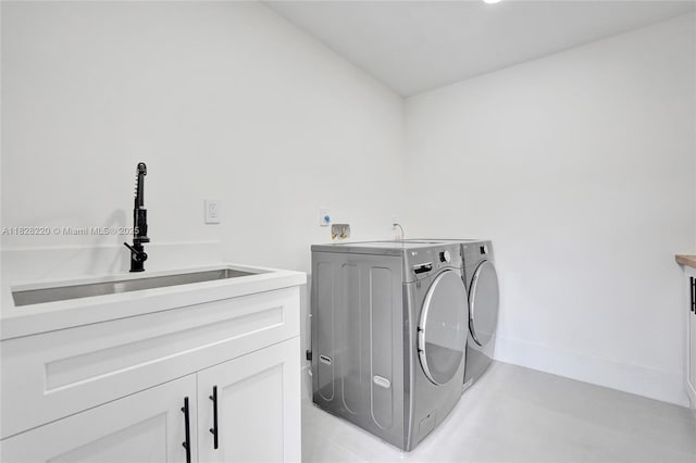 5850 Rose Ter, Plantation, FL 33317 - laundry area featuring separate washer and dryer and cabinet space