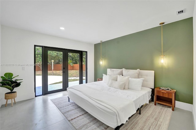 5850 Rose Ter, Plantation, FL 33317 - bedroom with access to exterior, french doors, concrete flooring, and recessed lighting