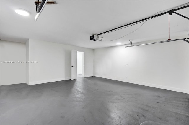 5850 Rose Ter, Plantation, FL 33317 - garage with a garage door opener and baseboards