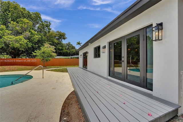 5850 Rose Ter, Plantation, FL 33317 - deck featuring french doors and a patio area