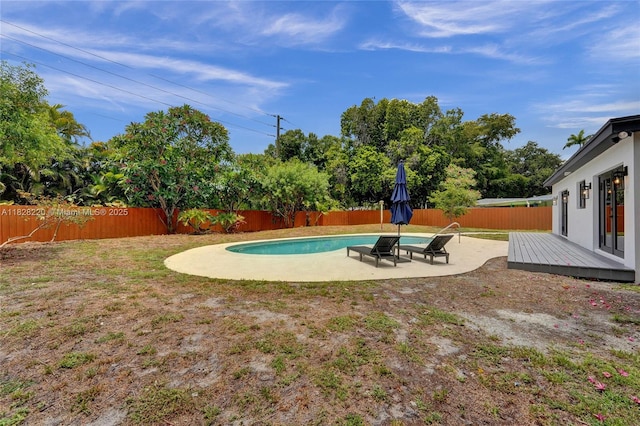 5850 Rose Ter, Plantation, FL 33317 - fenced backyard featuring a patio and a wooden deck