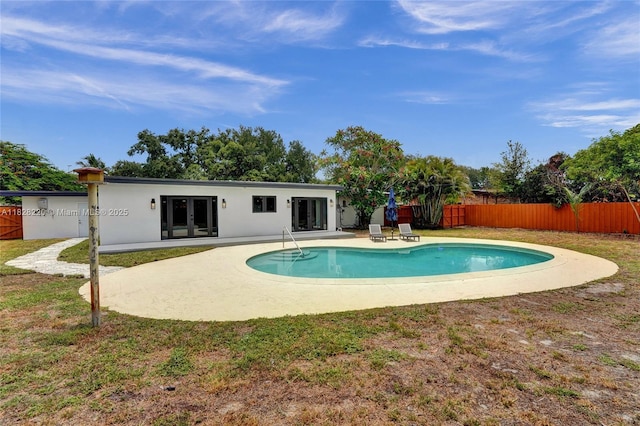 5850 Rose Ter, Plantation, FL 33317 - view of swimming pool with french doors and a patio
