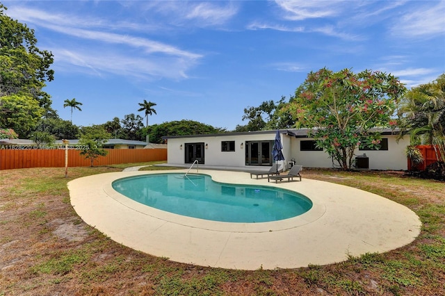 5850 Rose Ter, Plantation, FL 33317 - view of swimming pool featuring french doors and a patio