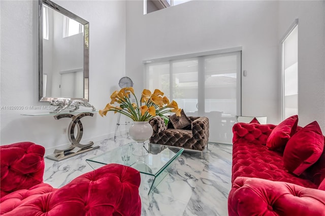 16488 SW 30th St, Miramar, FL 33027 - living area featuring marble finish floors and a towering ceiling