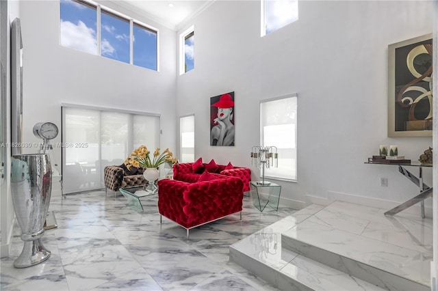 16488 SW 30th St, Miramar, FL 33027 - living room with marble finish flooring, plenty of natural light, crown molding, and a towering ceiling