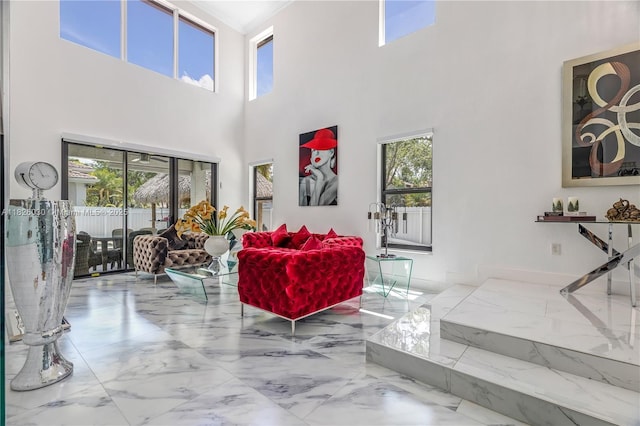 16488 SW 30th St, Miramar, FL 33027 - living area with marble finish floors and a high ceiling
