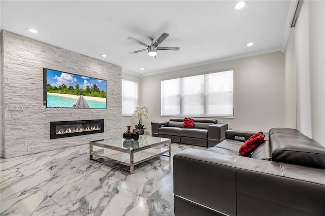 16488 SW 30th St, Miramar, FL 33027 - living area with ornamental molding, a ceiling fan, recessed lighting, light marble finish flooring, and a stone fireplace