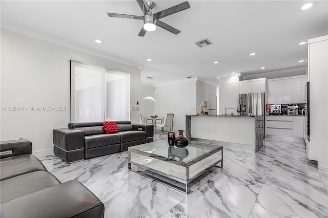 16488 SW 30th St, Miramar, FL 33027 - living area with ornamental molding, recessed lighting, ceiling fan, and light marble finish flooring