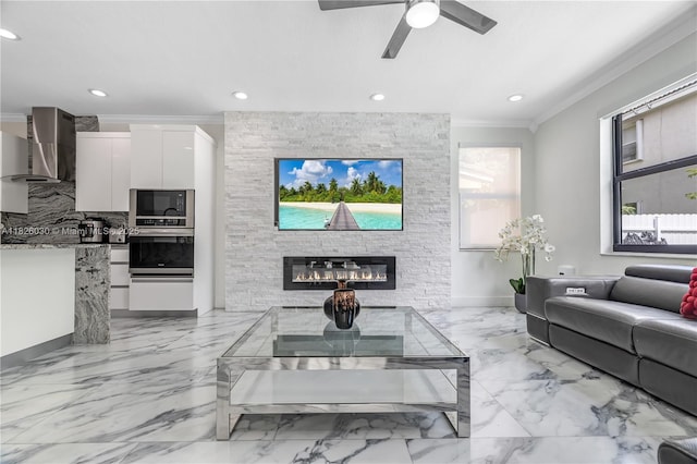 16488 SW 30th St, Miramar, FL 33027 - living area featuring ornamental molding, light marble finish floors, recessed lighting, a stone fireplace, and a ceiling fan