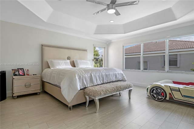 16488 SW 30th St, Miramar, FL 33027 - bedroom featuring a tray ceiling, light wood-type flooring, ceiling fan, and crown molding