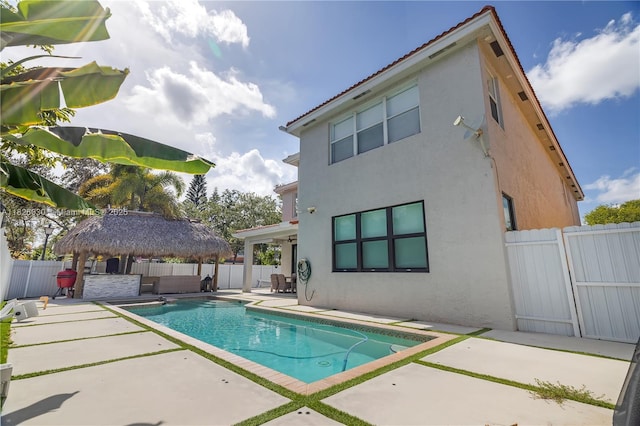 16488 SW 30th St, Miramar, FL 33027 - view of pool featuring a patio area, a gazebo, and a fenced backyard
