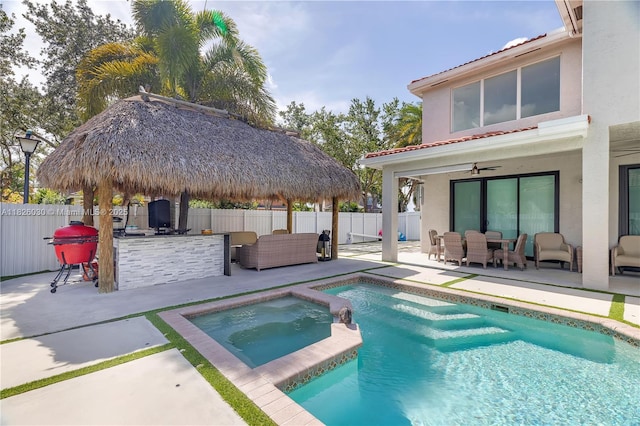16488 SW 30th St, Miramar, FL 33027 - view of swimming pool with a patio area, a fenced backyard, and an outdoor hangout area