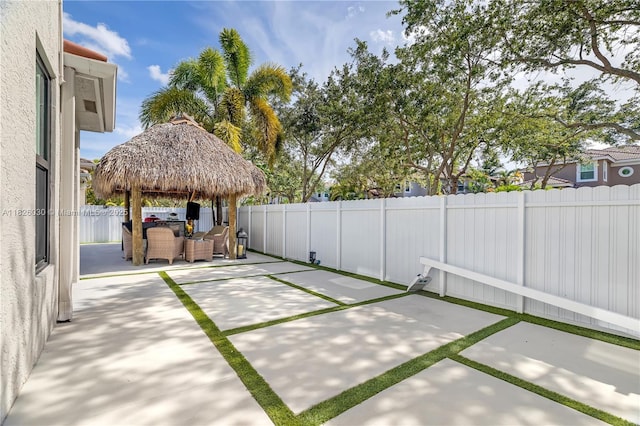 16488 SW 30th St, Miramar, FL 33027 - fenced backyard featuring a patio, a gazebo, and outdoor lounge area