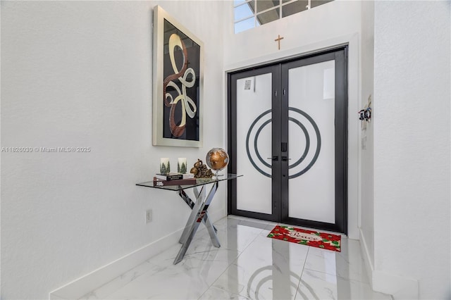 16488 SW 30th St, Miramar, FL 33027 - foyer entrance featuring marble finish flooring and french doors