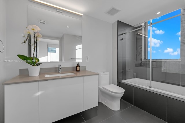 1600 NE 1st Ave Unit 2916, Miami, FL 33132 - bathroom featuring enclosed tub / shower combo, vanity, and tile patterned flooring