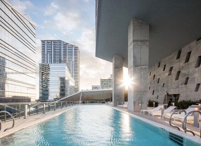 88 SW 7th St Unit 3006, Miami, FL 33130 - community pool featuring a city view and a patio area