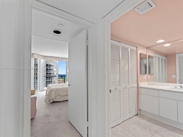 16445 Collins Ave Unit 726, Sunny Isles Beach, FL 33160 - hall with light carpet and recessed lighting