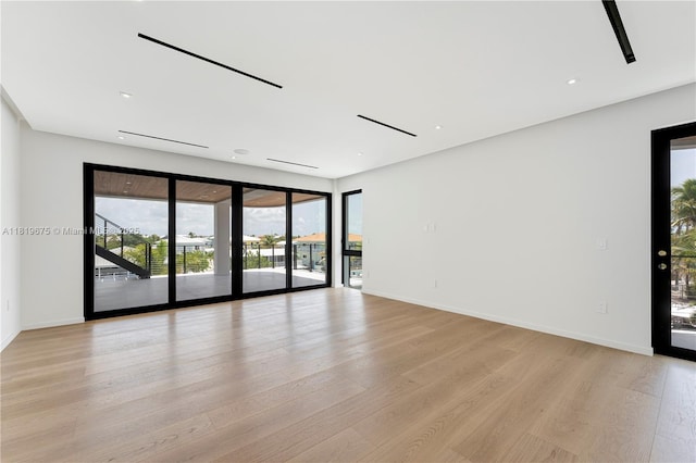 301 Buttonwood Cir # B, Key Largo, FL 33037 - empty room with light wood-style floors and plenty of natural light