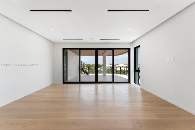 301 Buttonwood Cir # B, Key Largo, FL 33037 - spare room featuring light wood finished floors and recessed lighting